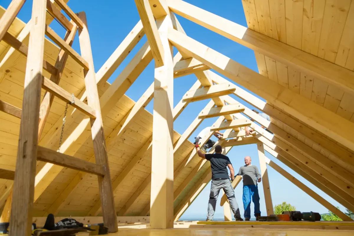 Builders Rodney team constructing a timber roof structure for the About Us page